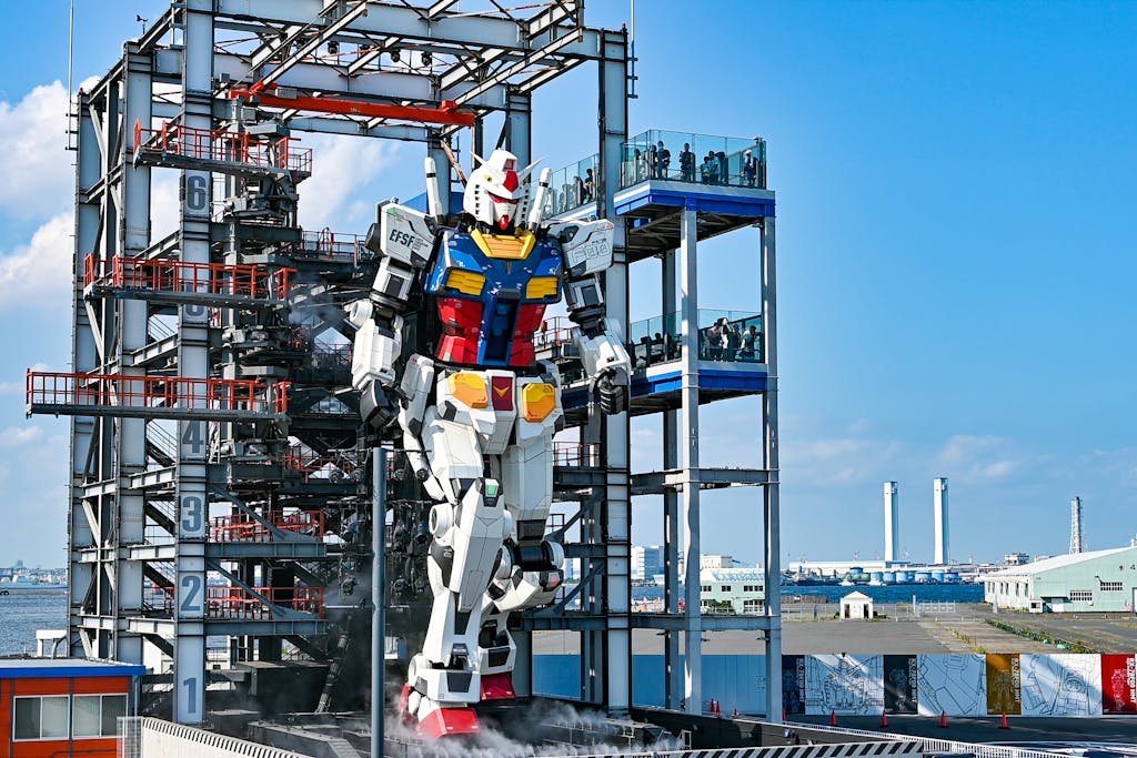 A large robot is standing on a platform